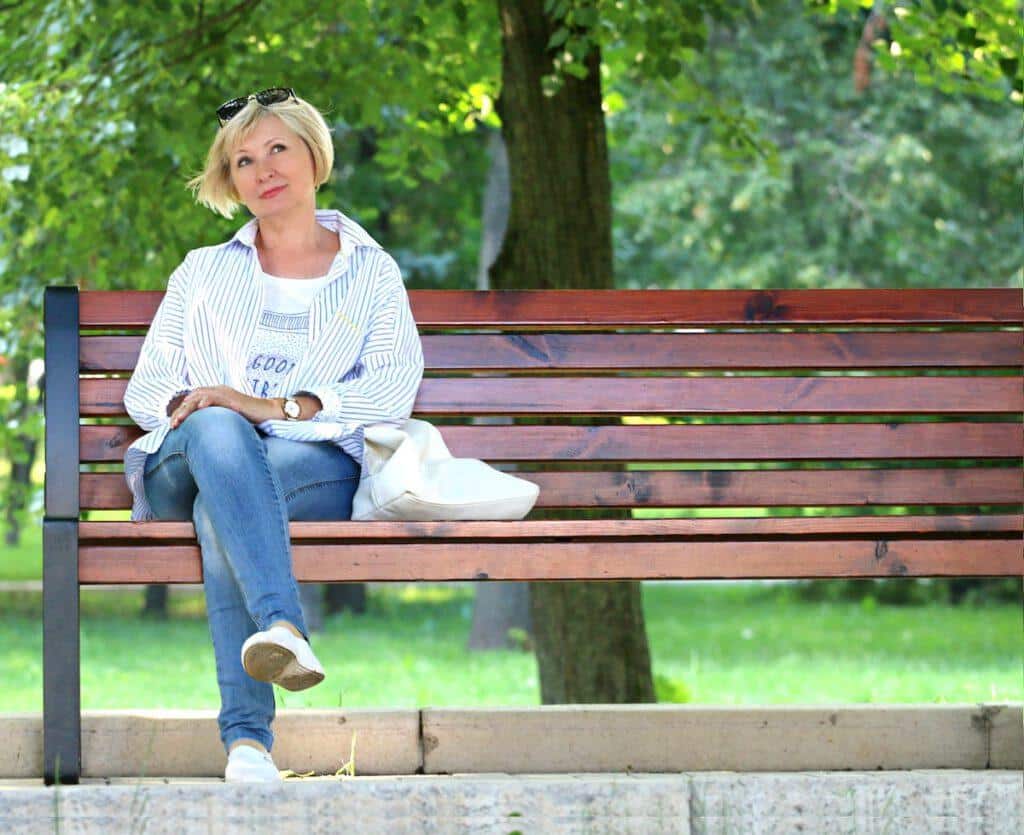 Woman on a bench thinking