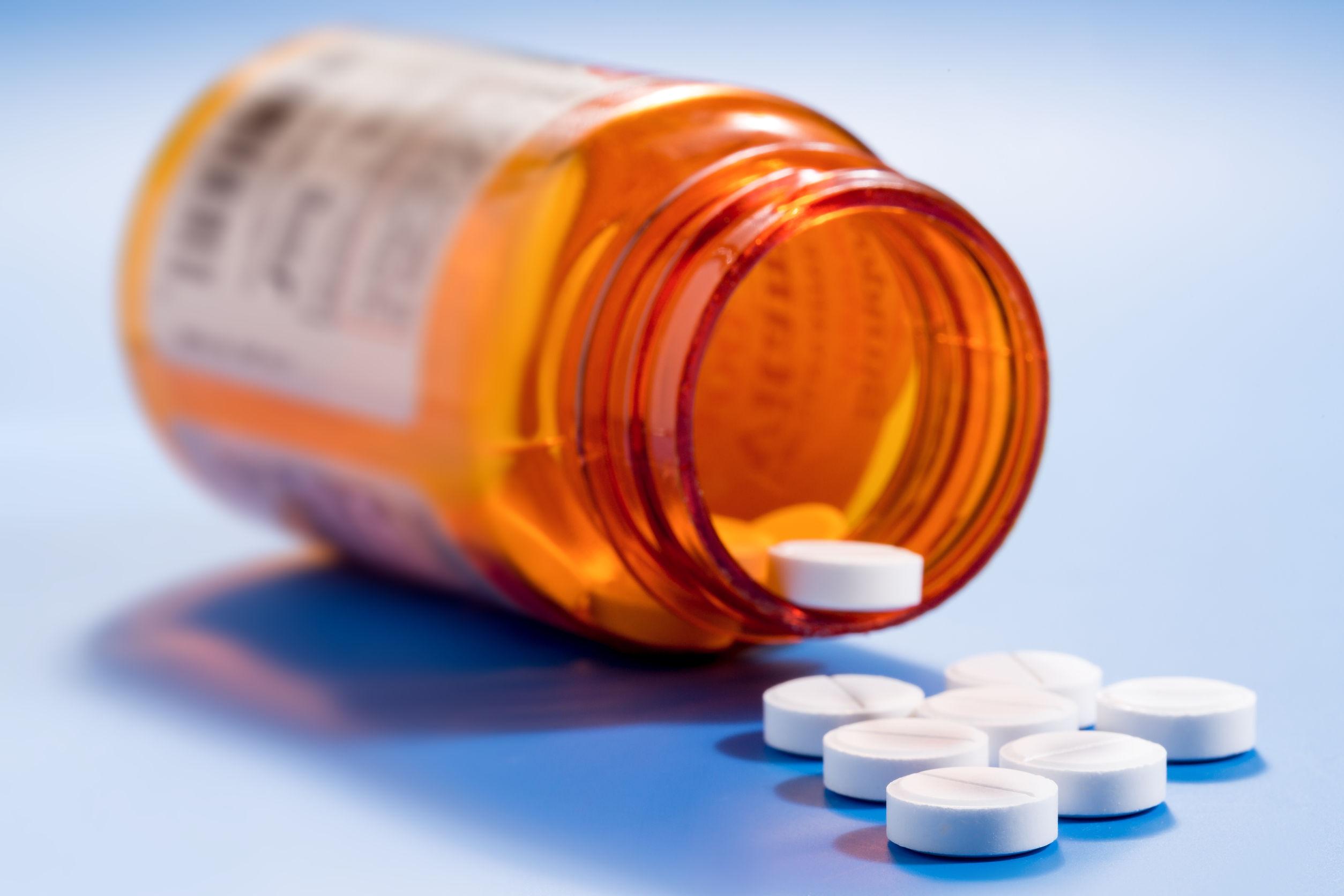Pills in a bottle to represent medication